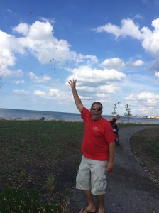 Throwing "Helicopters" in the wind.  These are little seeds that when thrown in the air will spin on the way down.