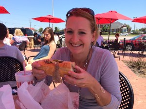 Rhonda Enjoying her 4th Beef of the Trip  