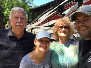 Family photo op with grandparents before leaving.  Daddy says I took a good picture for them, which is hard with these paws.