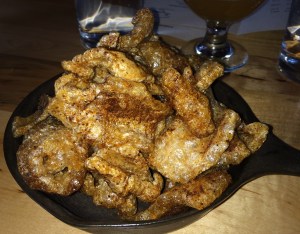 This is a pile of the best pork rinds Mommy and Daddy have ever had.  Luckily they did sneak me out some for later.